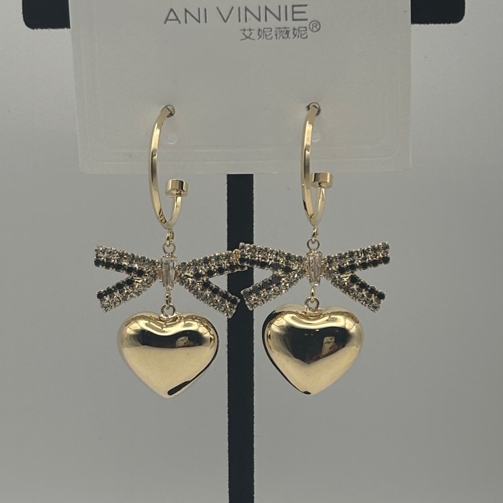 Gold Heart Earrings with Black Bow Accents